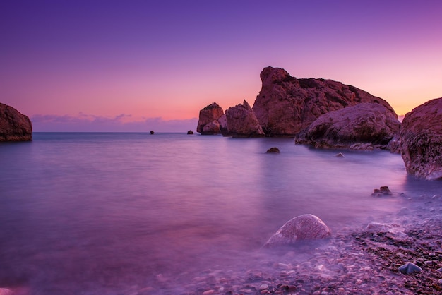 Love beach Aphrodite's Rock Aphrodite's birthplace near Paphos City Cyprus island at sunset