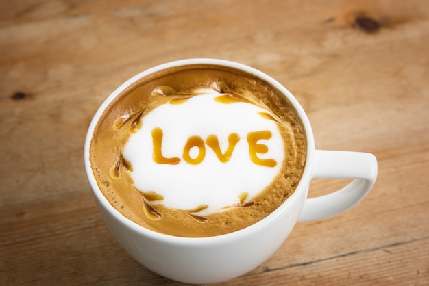 Photo love in coffee cup