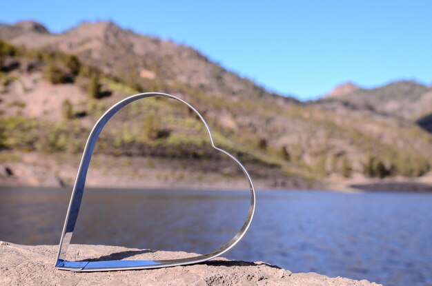 Love Concept Heart Shaped Metal near the Water