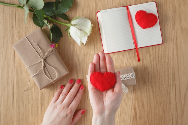 Love concept. holding a red heart in hands