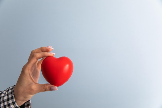 love concept woman holding red heart