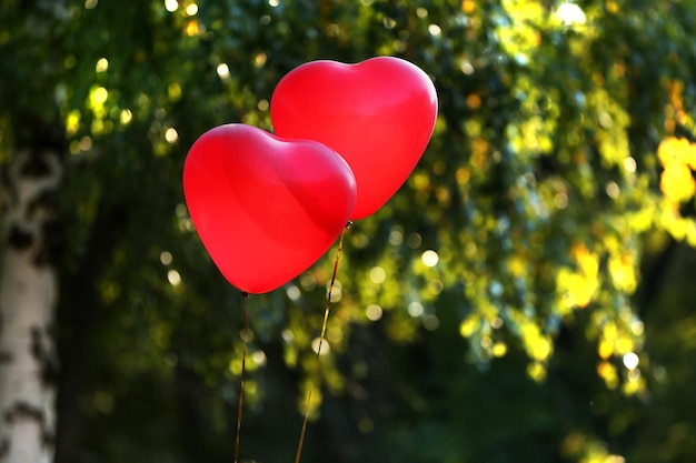 Love heart balloons, outdoors