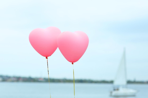 Love heart balloons, outdoors