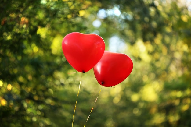 Love heart balloons, outdoors