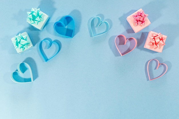 Love hearts and gifts on blue background