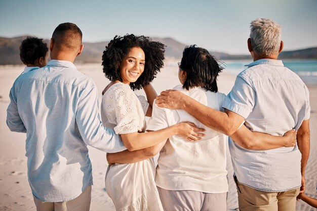 Photo love hug beach portrait and family walking bond or enjoy quality time together for vacation holiday peace or freedom ocean sea summer travel or back view of relax people in rio de janeiro