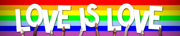 Love is love LGBT banner human hands holding colorful letters