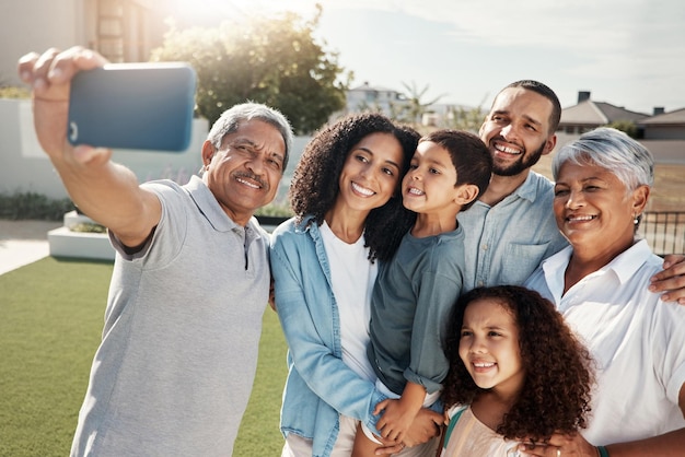 Love smile and selfie of happy big family bonding relax or enjoy quality time together in Rio de Janeiro Brazil Holiday vacation backyard photo or youth children parents and grandparents reunion