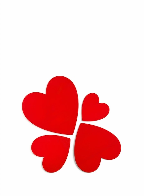Love symbols on Valentine day, red painted hearts top view