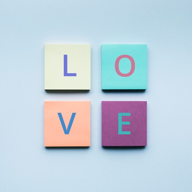 Love text on colorful of notepaper 

