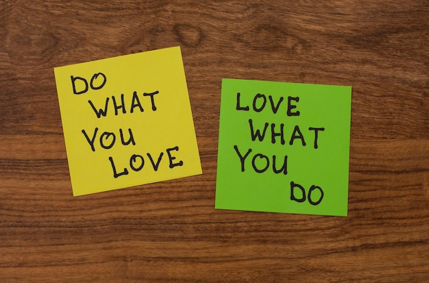 Love What You Do and Do What You Love notes pasted on blackboard