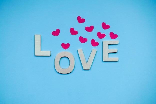 Love word on the blue background for valentines day