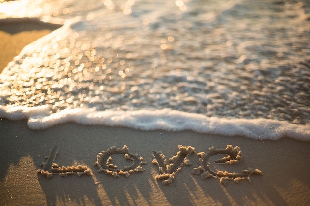 Love written on the beach 