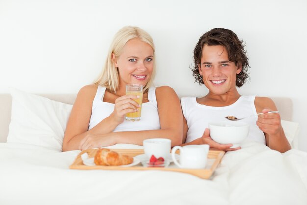 Lovely couple having breakfast