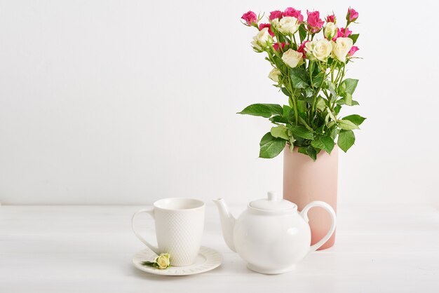 Lovely cup and teapot set with rose flowers