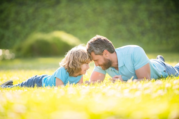 Lovely dad with kid on summer day parenting and fatherhood fathers day