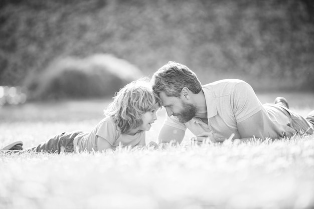 Lovely dad with kid on summer day parenting and fatherhood fathers day