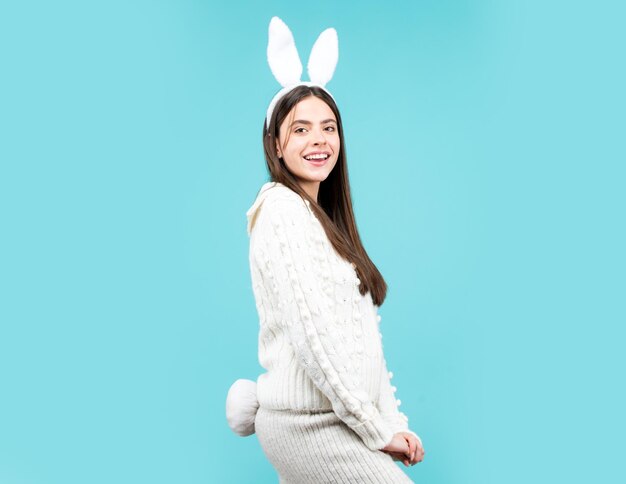 Lovely easter woman in bunny rabbit costume girl wearing bunny ears on easter holidays