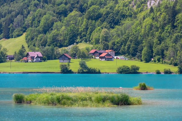 Lovely emerald green lake lungerersee in swiss alps canton of obwalden switzerland