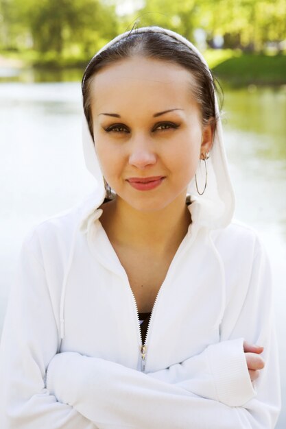 Lovely girl girl  beside a lake