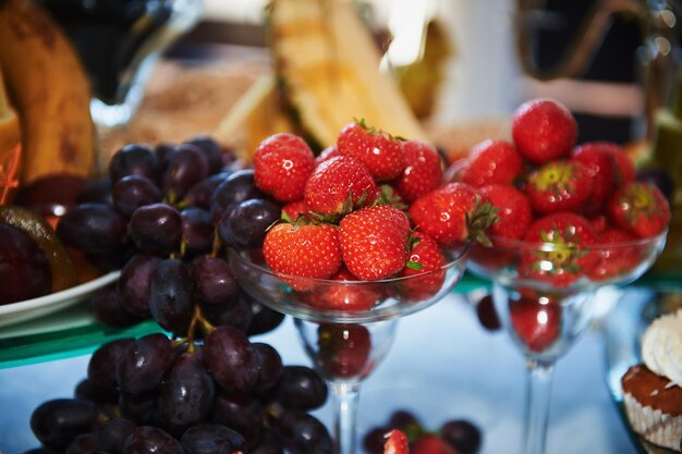 Lovely juicy berries strawberries and grapes