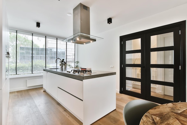 Lovely kitchen with black doors