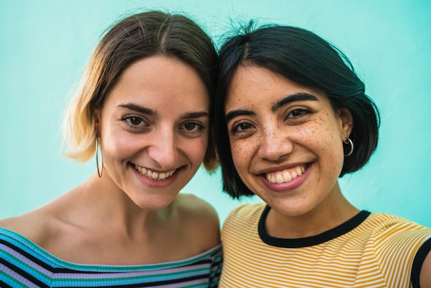 Lovely lesbian couple taking a selfie.