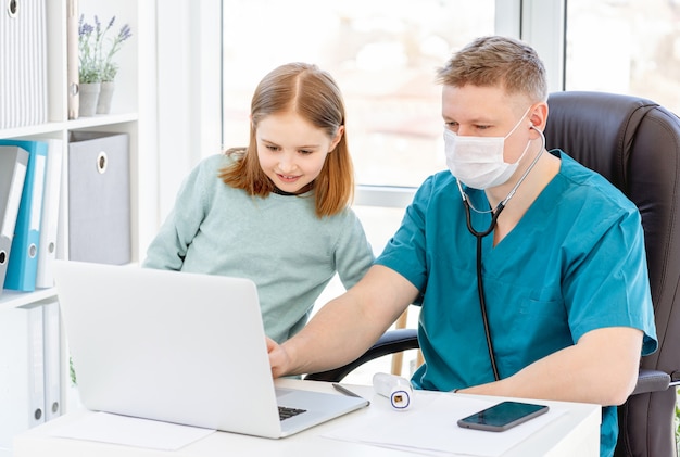 Lovely little girl with doctor