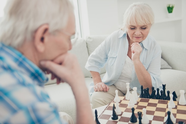 Lovely older couple posing together indoors