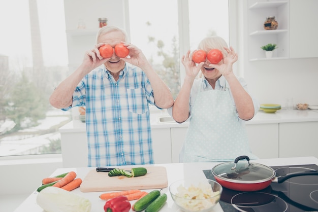 Lovely older couple posing together indoors