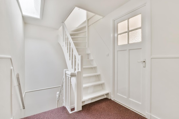 Lovely staircase design with red carpet