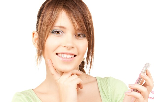 lovely teenage girl with calculator over white