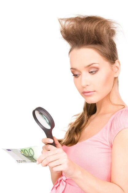 Photo lovely woman with magnifying glass and money