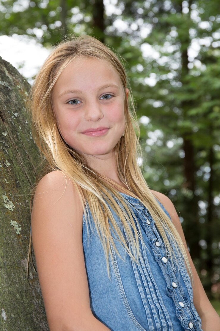 Lovely young blond girl with long hair