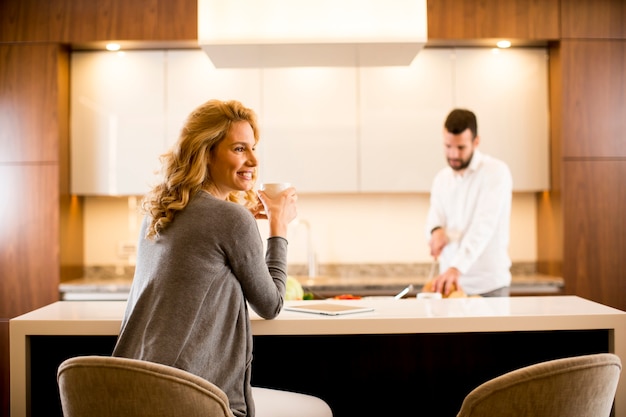 Lovely young couple in the modern kitchen