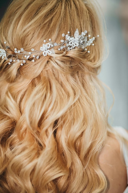 Lovely young woman bride in a lavish wedding dress