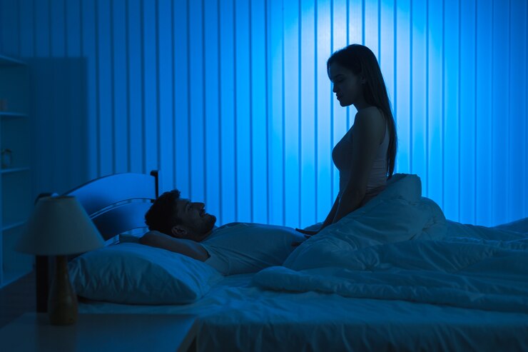 The lovers have sex in the bed. night time