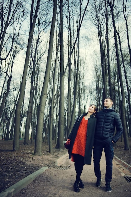 lovers resting in a city park in the winter