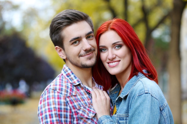 Loving couple in autumn park