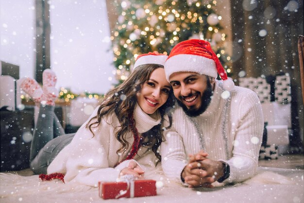 A loving couple celebrates Christmas