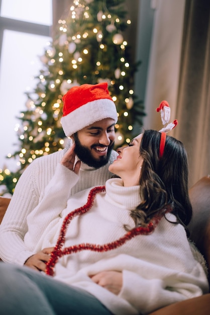 A loving couple celebrates Christmas