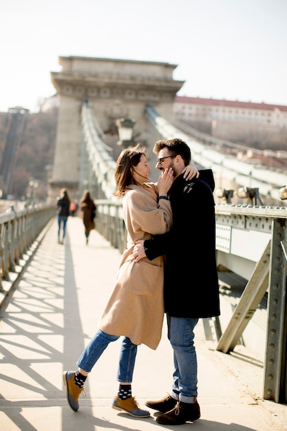 Loving couple on Chain bridge, Budapest