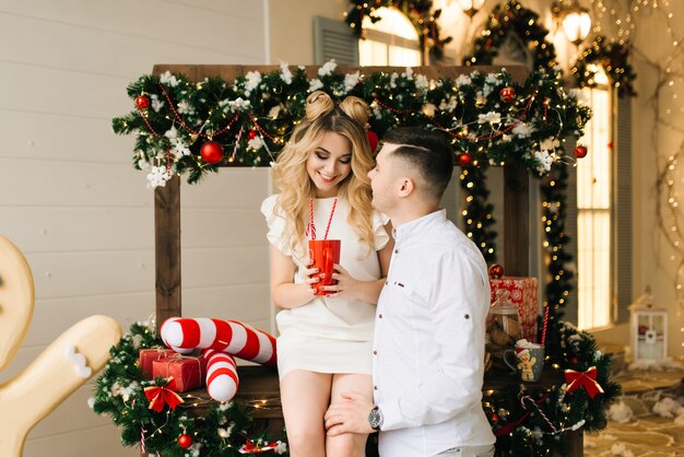 Loving couple in a Christmas decor