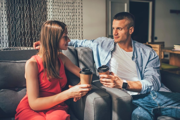 Loving couple having coffee together in cafe