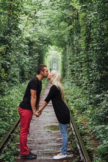 Photo loving couple on the iron road ukraine