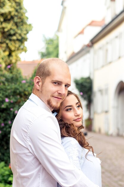 A loving couple is walking around the city.  Happy couple. Wedding. Love.