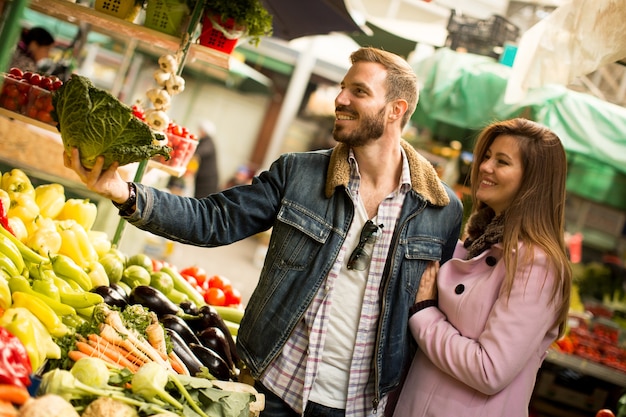 Loving couple on market