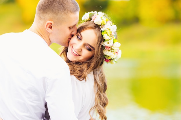 Loving couple near a beautiful lake