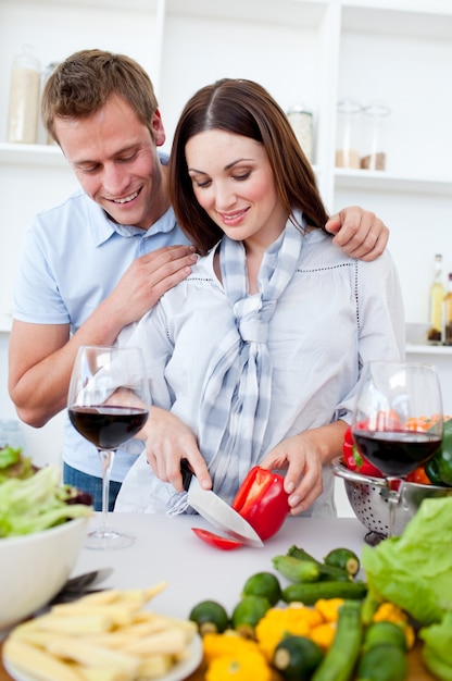 Loving couple preparing dinner