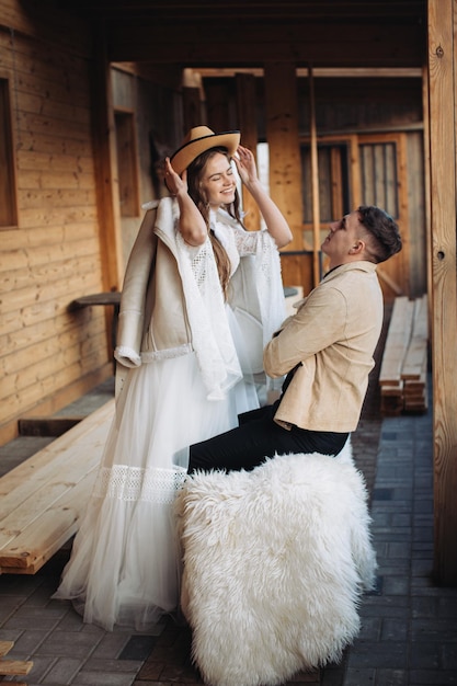 Loving couple on a ranch in the west in winter